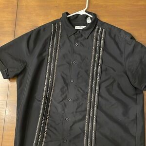 Cuban short-sleeved black with gold stitching.